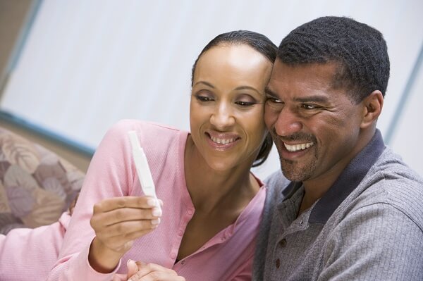 Couple with positive home pregnancy test