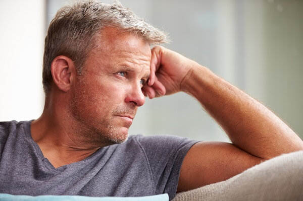 Mature Man Suffering From Depression At Home