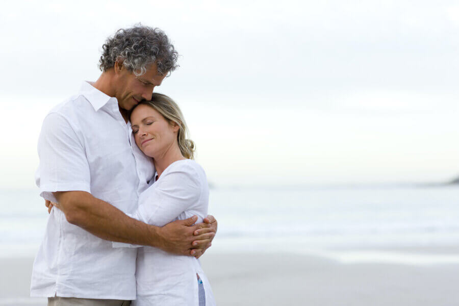 age fertility family planning
couple hugging on beach